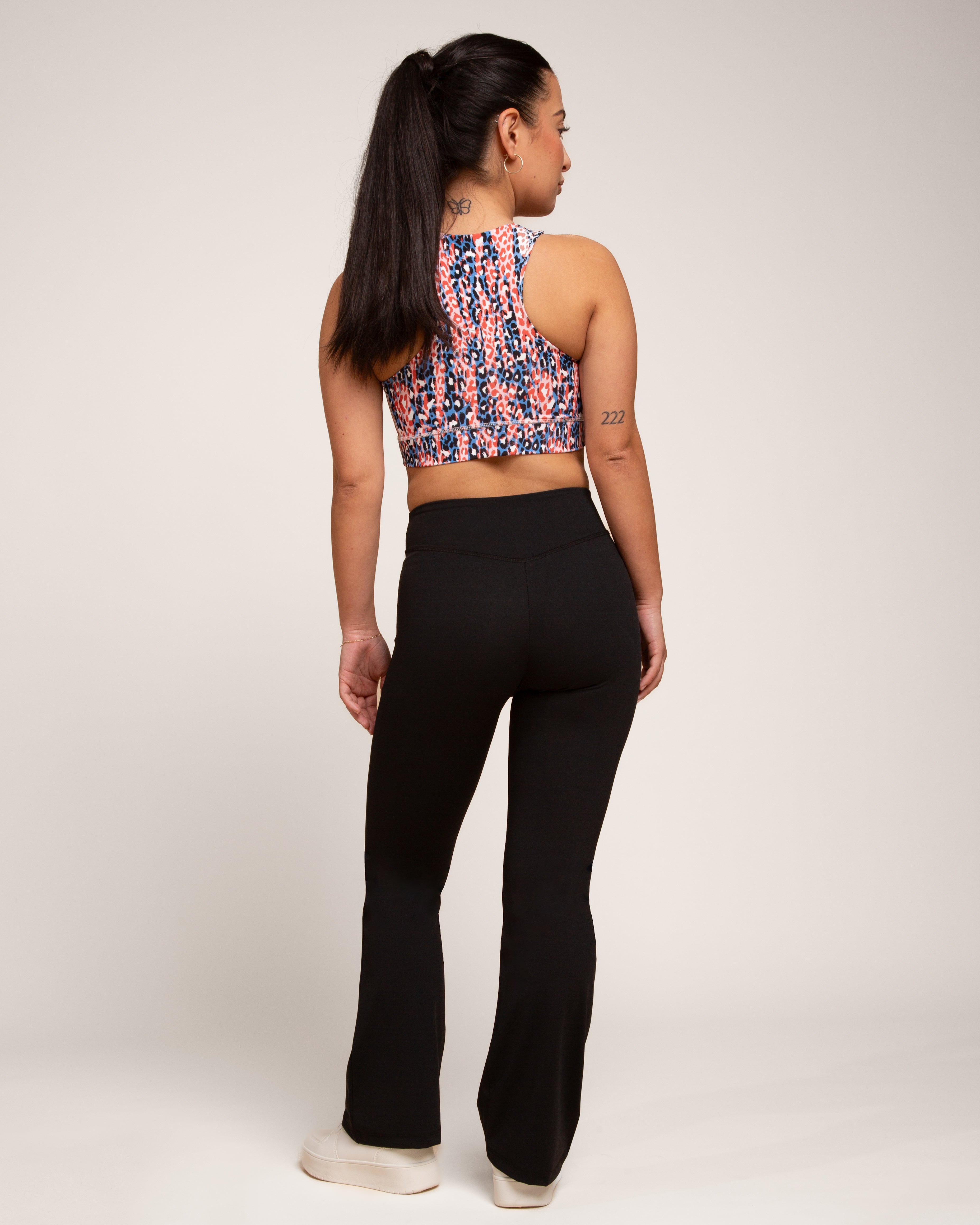 a woman in black pants
