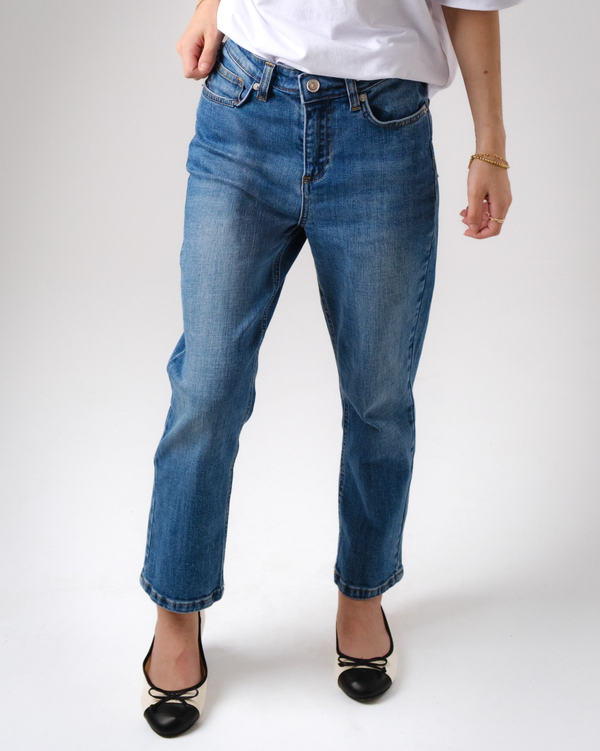 a person wearing blue jeans