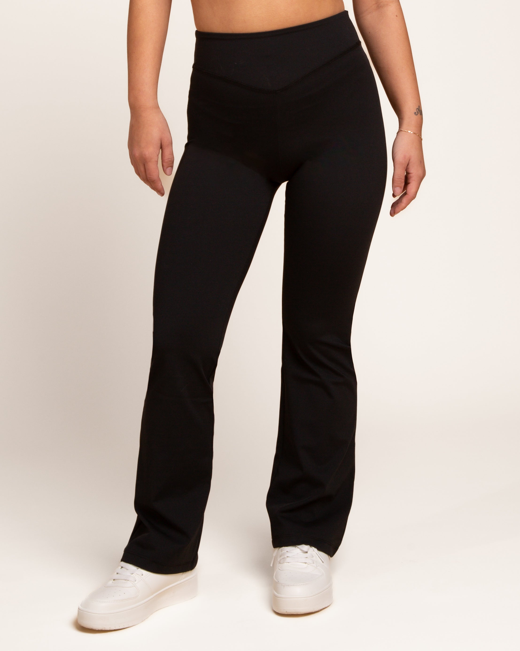 a person wearing black pants