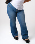a woman wearing blue jeans