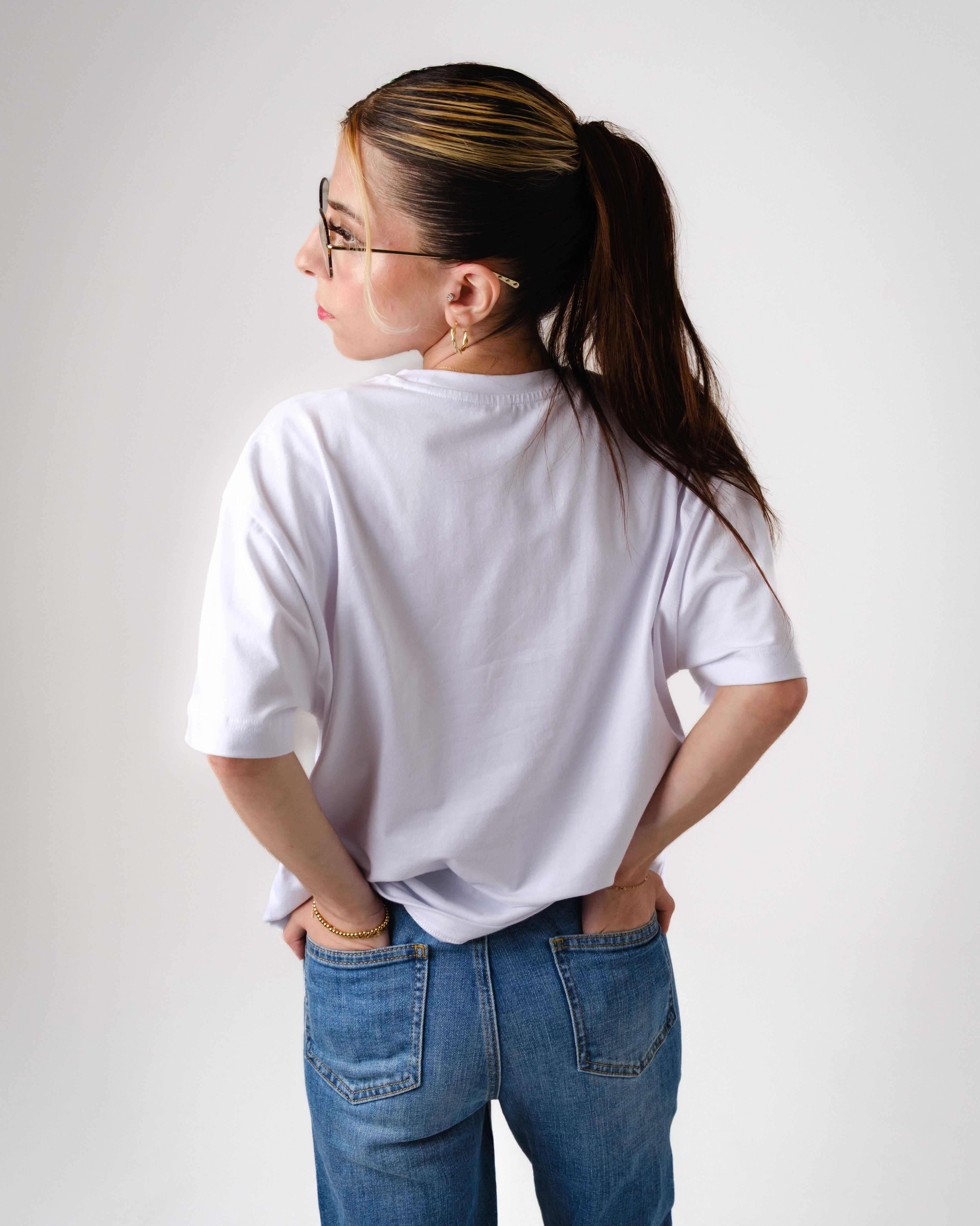 a woman with her hands in her pockets