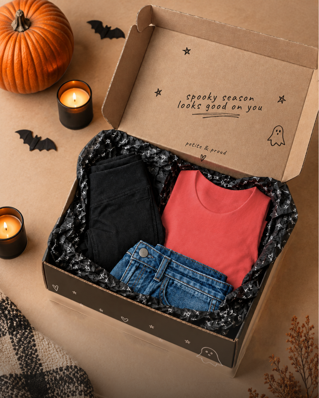 a box with clothes and candles